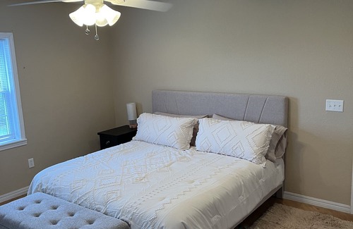 Board Camp House | Ride to the ATV trails from this Spacious 4-bedroom house with RV hookup!