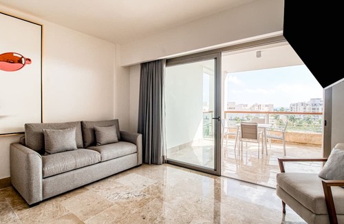 Playa Mujeres Apartment | 4th-floor resort apt with outdoor pools, pool spas, tennis, gym, & balcony