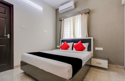 Tirupur Hotel | Capital O New Paradise Inn