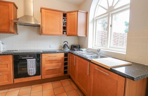 Tunstead Cottage | THE COACH HOUSE, pet friendly, with pool in Stalham