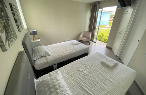 Ventanilla Hotel | Bungalow Jatun Mama
