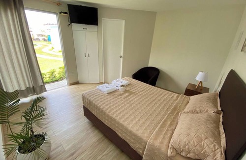 Ventanilla Hotel | Bungalow Jatun Mama