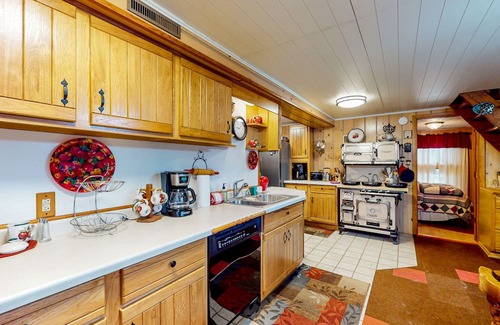 Hazelhurst House | Lakefront dog-friendly home with kayaks, rowboat, dock, private lake, & firepit