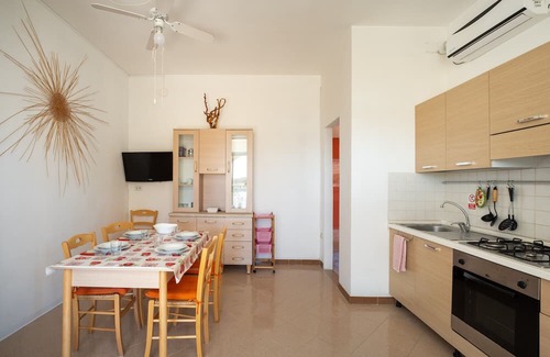 Punta Prosciutto Apartment | Apartment 'Villa Ada Rosa' with Private Terrace, Wi-Fi and Air Conditioning