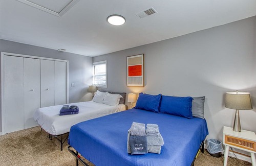 Taylor Apartment | Discover the epitome of comfort in this 4-bedroom, 3-bathroom haven.