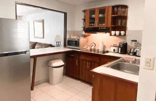 Quepos Apartment | Poolside Oasis near Manuel Antonio! AC/WiFi/Tennis