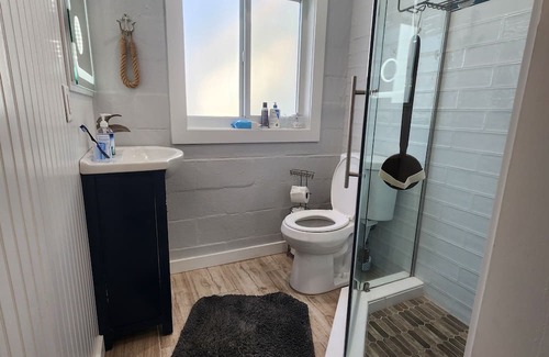 Indian River Estates Cottage | Cozy Waterfront Cottage w/ hot tub, dock & tiki