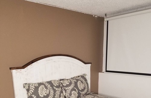 Summit Station House | Cozy Family friendly 4 bedroom house, mins from Downtown with hot tub in bedroom
