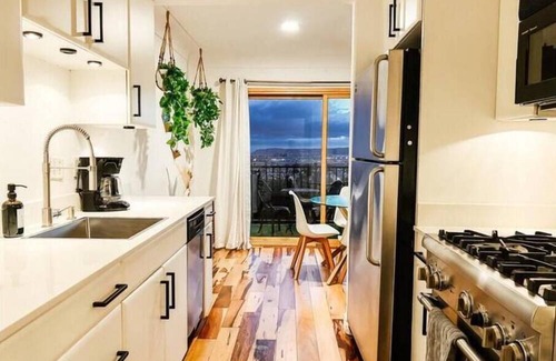 Mission Hills Condo | Modern Hilltop Haven: Great Location, Sea View, Balcony - Family & Work Friendly