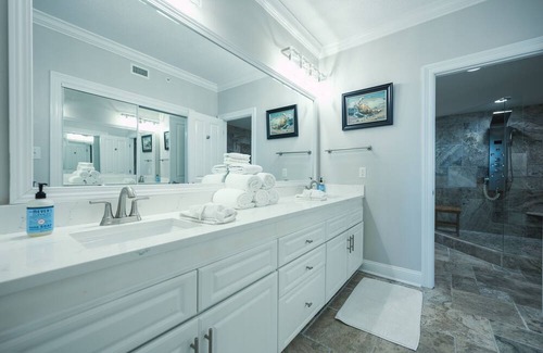 Orange Beach Condo | Luxe & Comfy Waterfront Gem: Heated Pool, Sandy Beach, Kayaks, Panoramic Views!