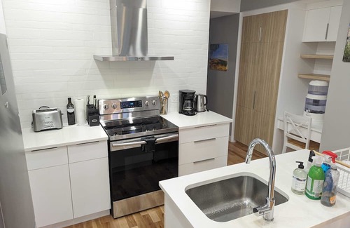 Verdun Condo | Cozy, modern, house-like condo, big backyard, sunny deck, space for 2 cars