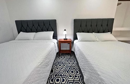 Tamarindo House | Deluxe Suite #9 for 4 + Breakfast Included