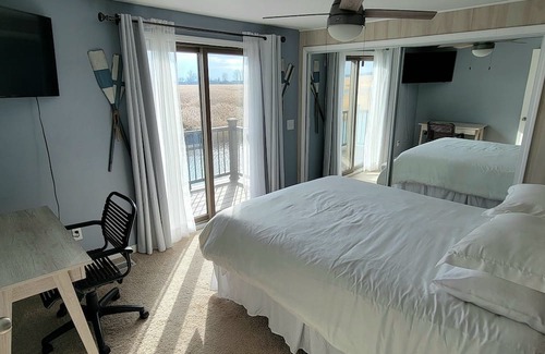 Anchorville House | Lake St. Clair Canal Cottage. Fishing, views, dockage, and more!