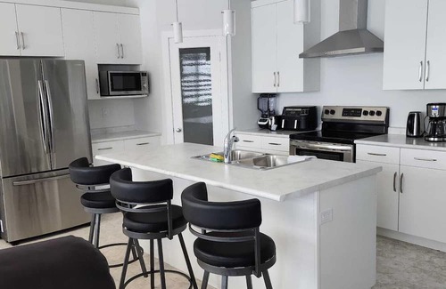 Winnipeg House | ChessKings Luxurious 4 Bedrooms in Sage Creek