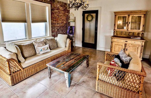 Maple Ridge Apartment | The Teak Follow, beautiful brick enclosed space