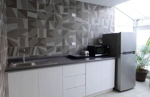 La Paz Apartment | Maison Lapinou - CUARTO NARANJA