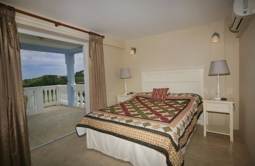Cap Estate Villa | Fairway And Ocean Views - Blue Moon 4 Bedroom Villa by RedAwning