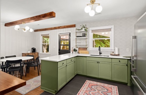 Gantt House | Weekend at GiGi's - a Greenville Mid-Century home with fire pit and game room.