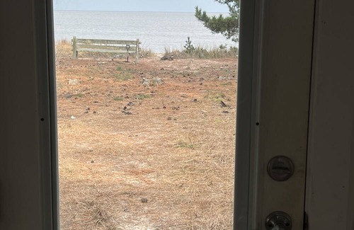 Slaughter Beach House | Beachfront Cottage with detached screened porch with stunning beach views.