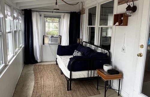 Slaughter Beach House | Beachfront Cottage with detached screened porch with stunning beach views.