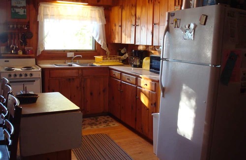 Naples House | Cozy cottage in serene setting with a lovely sandy entry to Brandy Pond!