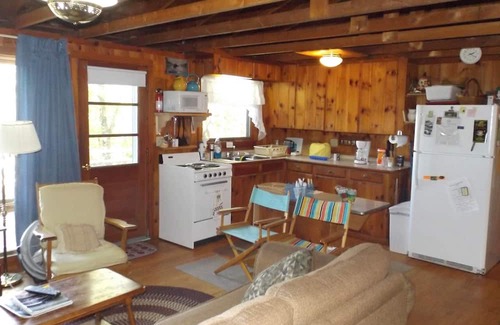 Naples House | Cozy cottage in serene setting with a lovely sandy entry to Brandy Pond!