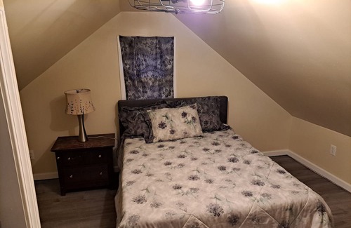 Spring Grove Village House | Charming woodside cabin feel.