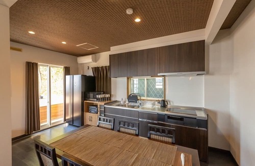 Sumoto House | Panoramic view of the ocean with a sunset view En / Sumoto Hyōgo
