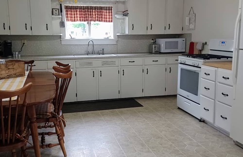 Laurelton House | White house walking distance to Penn's Creek and Bald Eagle State Forest.