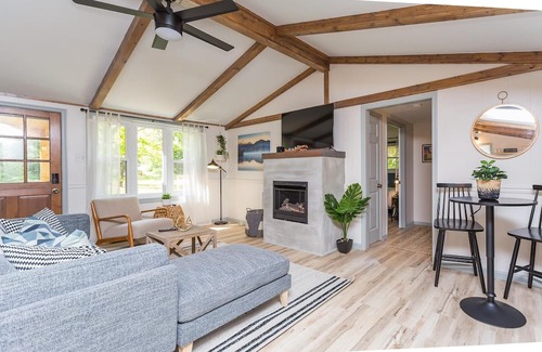 Elkton House | Riverfront with 2 homes featuring 7 bedrooms Outdoor Pavilion 2 Hot Tubs Fire Pit and Pool