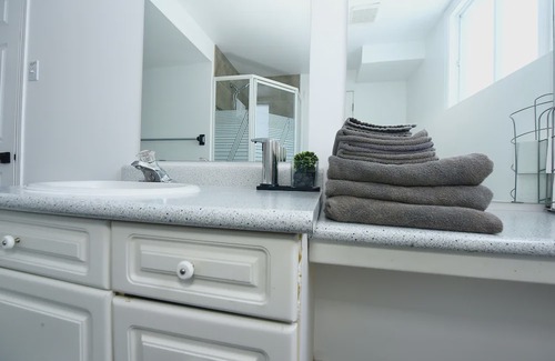 Amherstview Apartment | Spacious Hearth Escape with Natural Light & fireplace