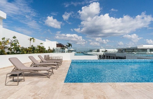 Gonzalo Guerrero Condo | Luxury Beach Condo with 4 Rooftop Pools, huge Gym, Bar, Restaurant, kids club & Spa