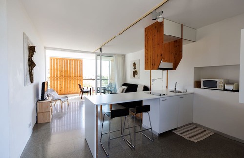 Pentakomo Apartment | Euploia | One-Bedroom Apartment, Art by PraXis Apartments