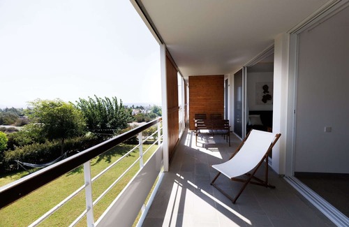 Pentakomo Apartment | Euploia | One-Bedroom Apartment, Art by PraXis Apartments