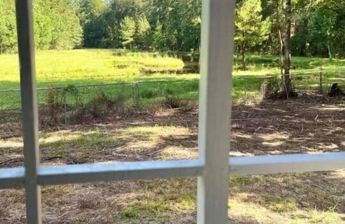 Pride House | Country Retreat with ponds-views-porches & pups