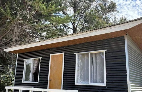 Ancud Cabin | “Descanso en el sur: Cabañita Chilota en Chiloé”