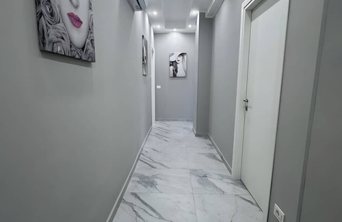 Monte Po-Nesima-San Leone-Rapisardi Apartment | Room 'Dolce Relax - Tripla Luxury' with Wi-Fi and Air Conditioning