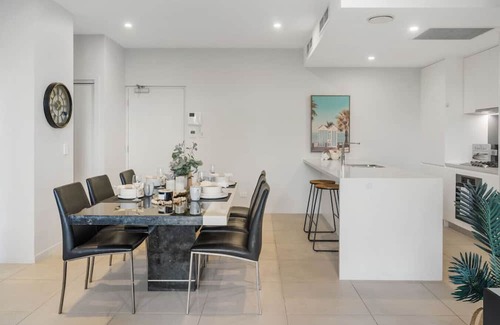 Macgregor Apartment | Modern 2BR Apartment Balcony & Central Convenience