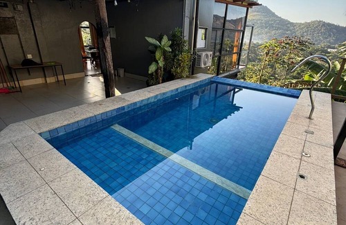 Vargem Grande House | Glass house with private pool