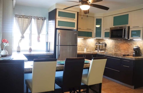 El Combate Apartment | Vibrant Location, Pool and Beach Hits