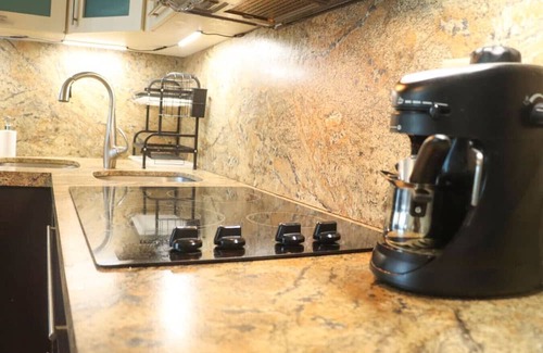 El Combate Apartment | Vibrant Location, Pool and Beach Hits