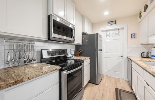 Port Aransas Condo | Roomy 1 BDRM Large Pool w/a Private Courtyard and a 5 Min Walk to the Beach