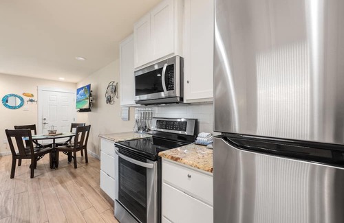 Port Aransas Condo | Roomy 1 BDRM Large Pool w/a Private Courtyard and a 5 Min Walk to the Beach