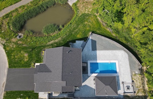Newtonville House | Modern Spacious 6-Bedroom Home with Heated Pool and Pool House 20 min from Track