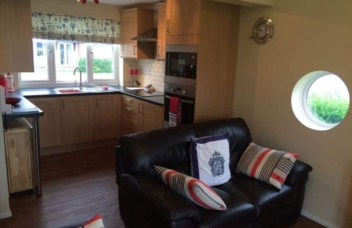 Hoveton Cottage | Refurbished cottage at the centre of Wroxham with private riverside garden.