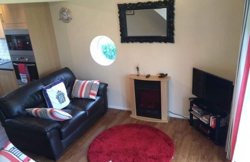 Hoveton Cottage | Refurbished cottage at the centre of Wroxham with private riverside garden.