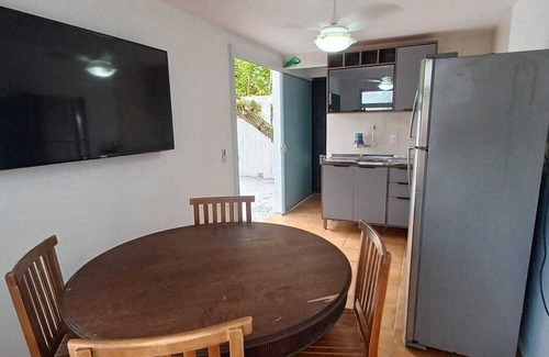 Armacao Apartment | One bedroom and living room apartment with fully equipped kitchen.