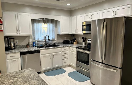 Cordova House | Luxury 5-Bedroom Retreat with Private Pool - Upscale Getaway with King Beds.