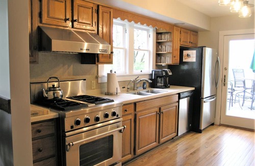Enchanted Hills House | Spacious and secluded 7-bedroom lake front retreat.