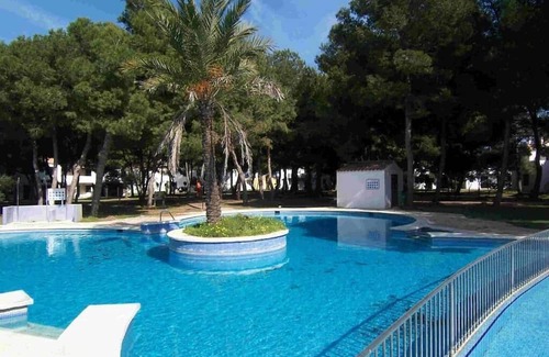 Son Xoriguer Apartment | Apartment Vermell Mar, relax in its clover pool immersed in a pine forest!